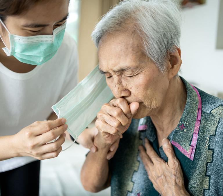 seriously ill patient hospital covid asian woman nurse